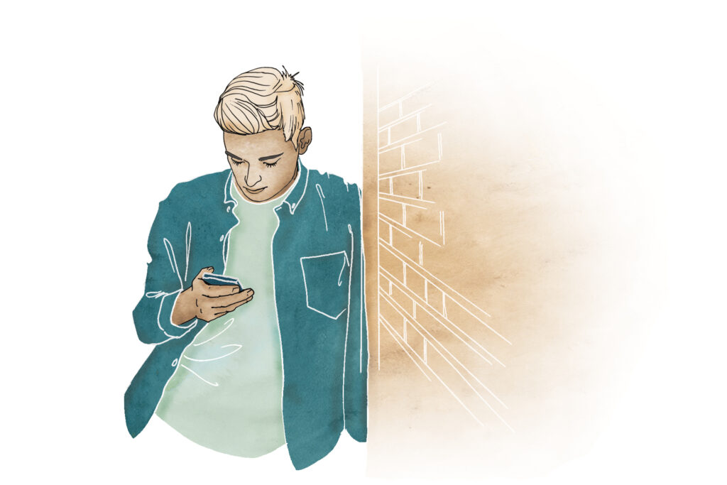 Young man texting mobile
